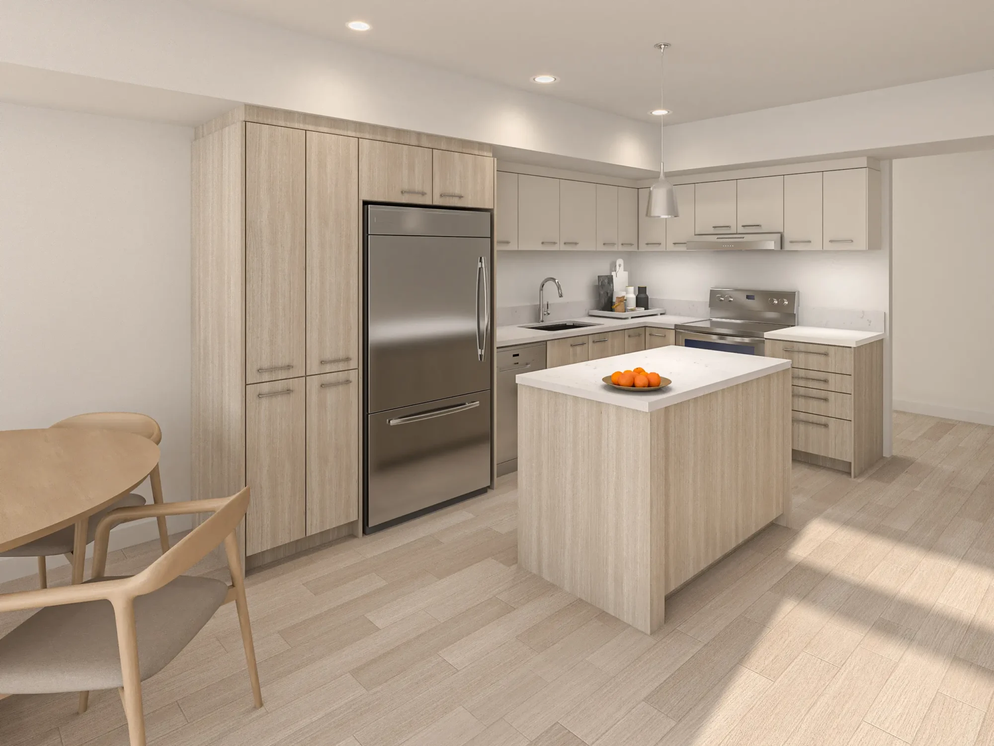 Cuisine moderne avec comptoirs de quartz et électroménagers en acier inoxydable appartement Le Saint-Michel.